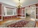 Bright dining room with bay window and chandelier at 715 E Broad St, Fuquay Varina, NC 27526