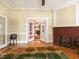 Spacious living room with fireplace and hardwood floors at 715 E Broad St, Fuquay Varina, NC 27526