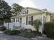 House exterior showcasing side porch details at 715 E Broad St, Fuquay Varina, NC 27526