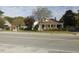 Two-story house with front porch, visible from across the road at 715 E Broad St, Fuquay Varina, NC 27526