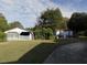 Detached shed and open carport in the backyard at 715 E Broad St, Fuquay Varina, NC 27526