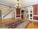 Formal dining room with hardwood floors and staircase view at 715 E Broad St, Fuquay Varina, NC 27526