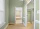 Hallway with access to bathroom and closet at 715 E Broad St, Fuquay Varina, NC 27526