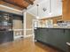 Kitchen features an island and built-in cabinetry at 715 E Broad St, Fuquay Varina, NC 27526