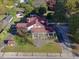 Aerial view of a two-story house with a large yard at 715 E Broad St, Fuquay Varina, NC 27526