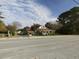 Two-story house with front porch, visible from across the road at 715 E Broad St, Fuquay Varina, NC 27526