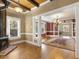 Open kitchen with wood beams and wood stove at 715 E Broad St, Fuquay Varina, NC 27526