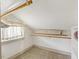 Walk-in closet with hanging rod and shelving at 715 E Broad St, Fuquay Varina, NC 27526