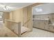 Upper hall with staircase and small kitchenette at 715 E Broad St, Fuquay Varina, NC 27526