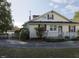 House exterior showcasing side elevation with porch at 715 E Broad St, Fuquay Varina, NC 27526