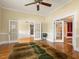 Living room with hardwood floors and built-in shelving at 715 E Broad St, Fuquay Varina, NC 27526