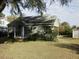 Small green house with shed in the backyard at 715 E Broad St, Fuquay Varina, NC 27526