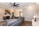 Spacious living room with sectional sofa and fireplace at 104 Loblolly Ct, Clayton, NC 27527