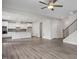 Open living space with hardwood floors and kitchen view at 315 Travelers Ct, Mebane, NC 27302