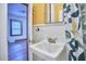 Simple bathroom with pedestal sink and shower/tub combo at 3007 University Dr, Durham, NC 27707