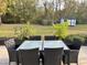 Patio furniture overlooking a spacious backyard with shed at 3024 Tuckland Dr, Raleigh, NC 27610