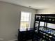 Bedroom with bunk beds and a window at 3024 Tuckland Dr, Raleigh, NC 27610