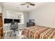 Bright bedroom featuring a bed, workspace, and ample natural light at 143 Rawhide Dr, Louisburg, NC 27549