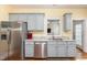 Kitchen boasts granite countertops and modern cabinetry at 143 Rawhide Dr, Louisburg, NC 27549