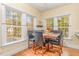 Breakfast nook with built-in seating and wooded views at 143 Rawhide Dr, Louisburg, NC 27549