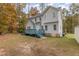 Two-story house with a deck, hot tub, and large backyard at 143 Rawhide Dr, Louisburg, NC 27549
