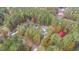 Aerial view of neighborhood with wooded areas at 143 Rawhide Dr, Louisburg, NC 27549