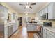 Open concept kitchen with island and hardwood floors at 143 Rawhide Dr, Louisburg, NC 27549