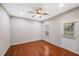 Spacious bedroom with hardwood floors and door to the outside at 254 Linden Park Ln Ln, Cary, NC 27519