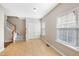 Bright entryway with stairs, tile flooring, and built-in storage at 254 Linden Park Ln Ln, Cary, NC 27519