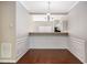 Dining room with hardwood floors and a view into the kitchen at 254 Linden Park Ln Ln, Cary, NC 27519