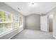 Spacious bedroom with large windows and grey carpet at 254 Linden Park Ln Ln, Cary, NC 27519