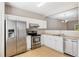 Kitchen with stainless steel appliances and white cabinets at 254 Linden Park Ln Ln, Cary, NC 27519