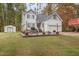 Two-story house with a large backyard and detached shed at 143 Rawhide Dr, Louisburg, NC 27549