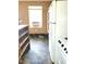 Kitchen features white appliances and tile flooring at 325 Ranch Farm Rd # A - B, Raleigh, NC 27603
