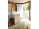 Laundry room with washer, dryer, and backyard access at 325 Ranch Farm Rd # A - B, Raleigh, NC 27603