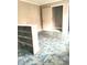 Spacious living room with built-in shelving and tile floors at 325 Ranch Farm Rd # A - B, Raleigh, NC 27603