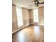 Spacious living room with hardwood floors and large windows at 325 Ranch Farm Rd # A - B, Raleigh, NC 27603