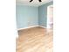 Living room with light blue walls and hardwood floors at 325 Ranch Farm Rd # A - B, Raleigh, NC 27603