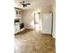 Kitchen features white cabinets and tiled floor at 325 Ranch Farm Rd # A - B, Raleigh, NC 27603