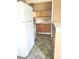 View of the kitchen with wood cabinets and tile floor at 325 Ranch Farm Rd # A - B, Raleigh, NC 27603