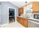 Kitchen with stainless steel appliances and wood cabinets at 7916 River Dare Ave, Youngsville, NC 27596