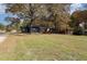 Ranch home with a large yard, gazebo, and mature trees at 2524 Christian Light Rd, Fuquay Varina, NC 27526