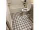 Updated bathroom with a new toilet and patterned floor at 1509 Burton St, Rocky Mount, NC 27803