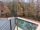 In-ground pool with surrounding deck at 196 Mountaintop Cir, Pittsboro, NC 27312