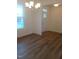 Bright dining room with hardwood floors and a chandelier at 432 Old Fashioned Way Way, Lillington, NC 27546