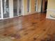 Hardwood floors in a spacious living room at 6349 Elevation Rd, Benson, NC 27504