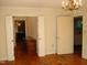 Spacious dining room with hardwood floors and views into kitchen at 6349 Elevation Rd, Benson, NC 27504