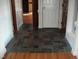 Entryway with slate tile flooring and hardwood accents at 6349 Elevation Rd, Benson, NC 27504