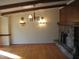 Spacious living room with hardwood floors and a fireplace at 6349 Elevation Rd, Benson, NC 27504