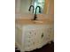 Elegant bathroom vanity with marble countertop and ornate detailing at 6349 Elevation Rd, Benson, NC 27504